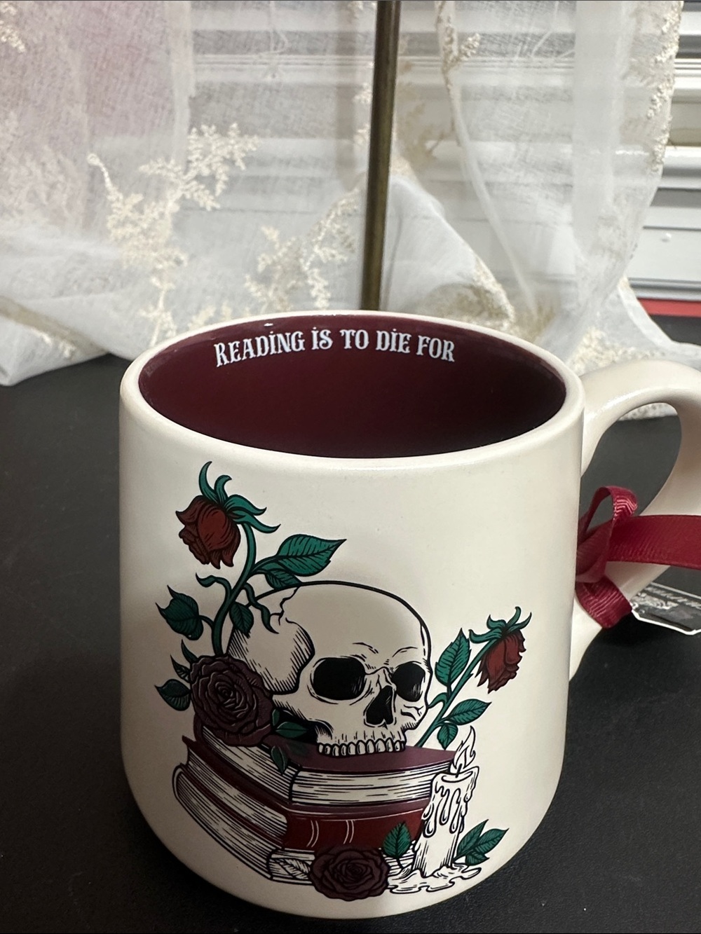 Sunday morning ceramics Halloween “reading is to die for” skull coffee mug